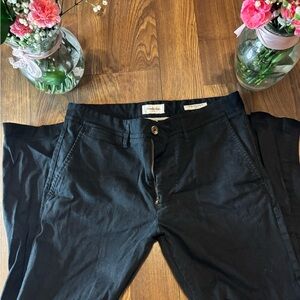 Men’s black slacks